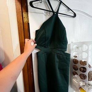 I’m selling an emerald green short length halter top dress
